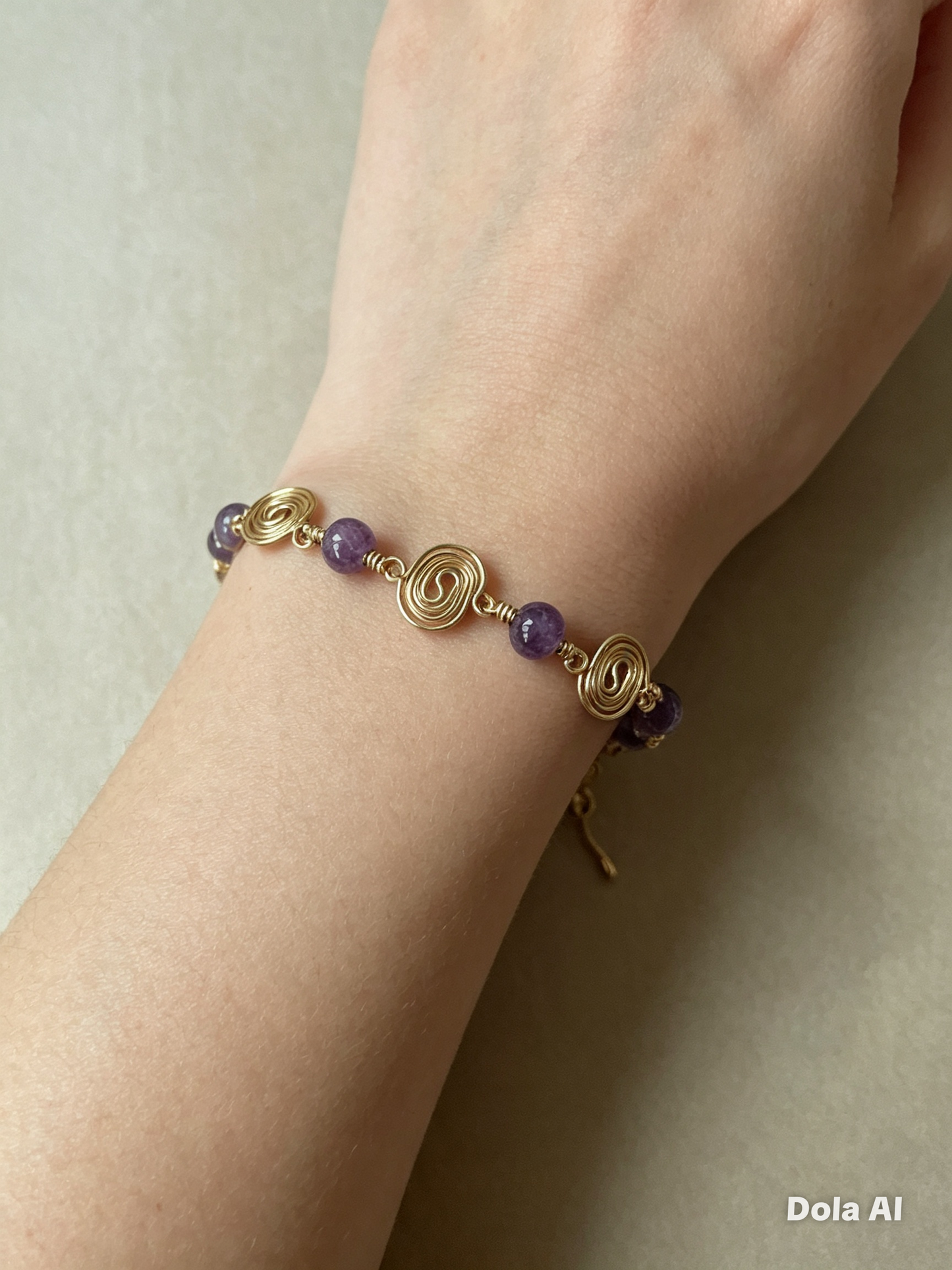 Gold Plated Spiral Bracelet with Amethyst Beads
