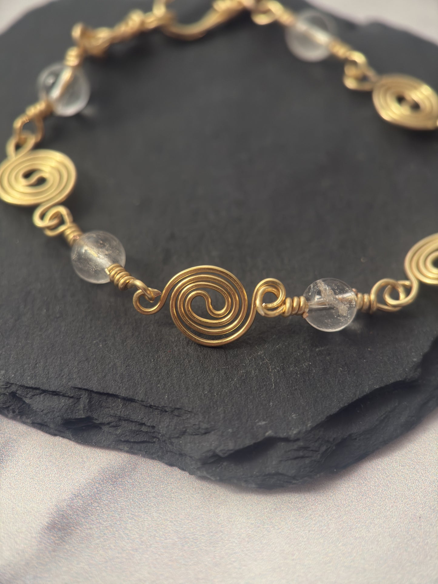 Gold Plated Spiral Bracelet with Clear Quartz Beads